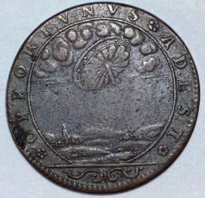 minted coin with UFO