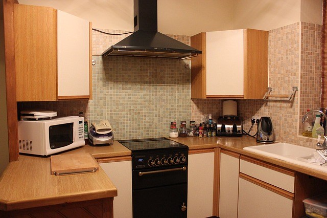 Kitchen with microwave oven